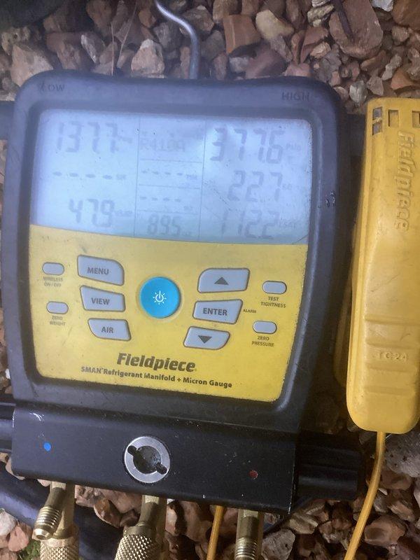 Responded to no cooling call on 10-year-old residential air conditioning system. Upon arrival, performed complete system diagnostics using refrigerant manifold gauges and pressure testing equipment. Evaluated compressor motor operation and assessed refrigerant line connections at outdoor condensing unit. System inspection revealed operational issues requiring pressure and vacuum measurements to determine proper refrigerant charge levels and system integrity. Documented equipment conditions and diagnostic readings for service records.