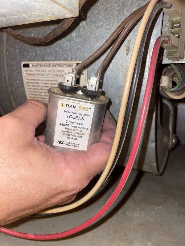 Responded to no cooling call on residential HVAC system. Upon arrival, found unit set to fan-only mode at thermostat. Diagnosed failed motor run capacitor (Titan PRO TOCF-7.5, 7.5µFD 440/370VAC) preventing compressor operation. Replaced defective capacitor with new unit, verified proper electrical connections, and restored system to cooling mode. System tested and operating within normal parameters upon departure.