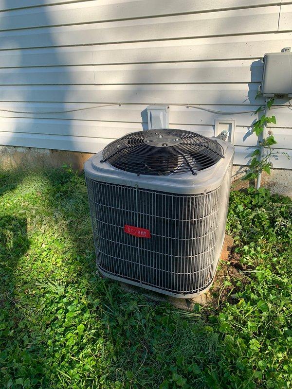 # HVAC Tune-Up Completed

Performed comprehensive preventative maintenance tune-up on a single outdoor air conditioning condenser unit located in backyard. Conducted standard inspection protocol including visual assessment of unit exterior, electrical disconnect box, conduit connections, and mounting hardware. Verified proper clearance around unit despite vegetation growth near base and wall-mounted components. Inspected indoor air handler system with focus on filter specifications and operational safety labels. All routine maintenance tasks completed per manufacturer guidelines for optimal system performance and seasonal readiness.