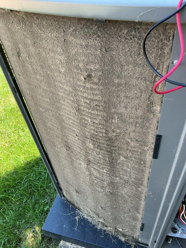 Responded to no cooling complaint on Lennox system with thermostat displaying "outdoor unit pressure strike out" alert affecting entire home. Upon inspection, discovered severely clogged outdoor unit filter restricting airflow to condensing unit. Removed and cleaned/replaced heavily soiled filter showing extensive dust and debris accumulation. Cleared pressure fault, restored proper airflow to outdoor unit, and verified system returned to normal cooling operation. System tested and operating within manufacturer specifications.