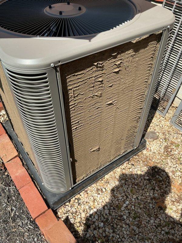 Responded to no cooling complaint on unit 10 located at side of home. Upon arrival, found outdoor condenser coil heavily restricted with thick accumulation of dust, dirt, and debris, significantly impeding airflow and heat transfer capability. Cleaned condenser coil thoroughly, removing several millimeters of caked-on buildup from fins and exterior panels. Restored proper airflow through unit. System returned to normal cooling operation following cleaning. Advised to monitor performance and recommended regular maintenance to prevent future airflow restrictions.