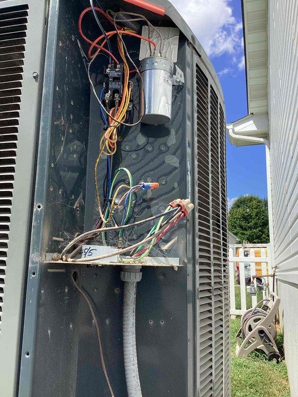 Responded to no-heat call on 7-year-old Trane system with outdoor fan not operating. Upon inspection, found failed dual run capacitor preventing condenser fan motor from starting. Replaced defective capacitor, verified proper voltage and amp draw on both compressor and fan motor circuits, and confirmed system returned to normal cooling operation with thermostat responding appropriately.