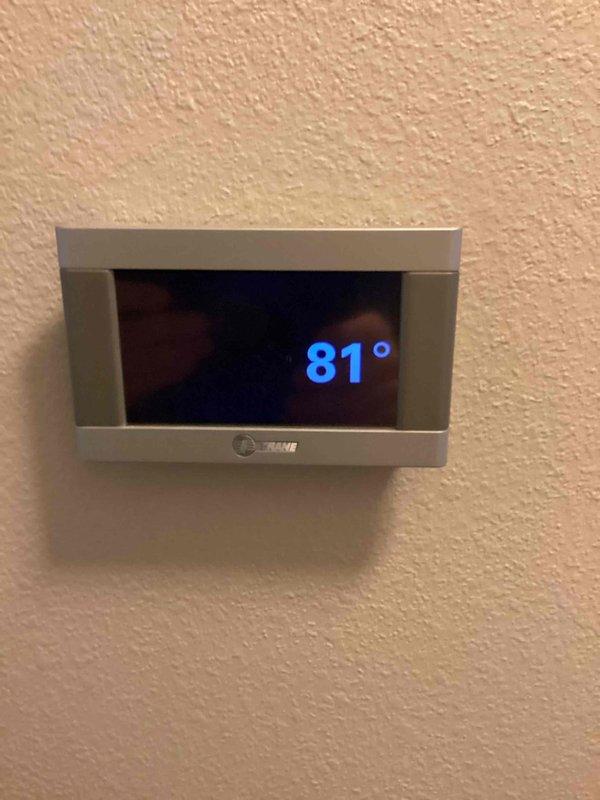 Responded to no-heat call on 7-year-old Trane system with outdoor fan not operating. Upon inspection, found failed dual run capacitor preventing condenser fan motor from starting. Replaced defective capacitor, verified proper voltage and amp draw on both compressor and fan motor circuits, and confirmed system returned to normal cooling operation with thermostat responding appropriately.