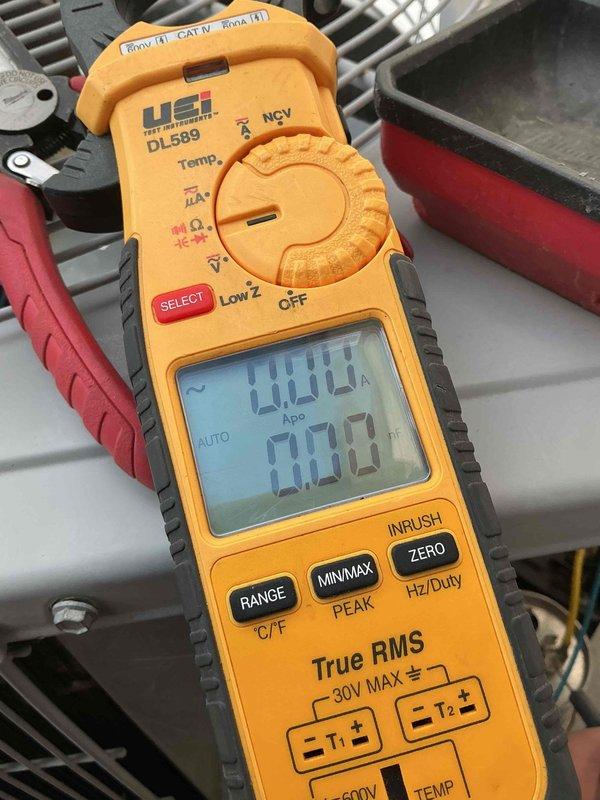 Responded to no cooling complaint on 12-year-old Carrier system with house temperature at 80°F. Upon arrival, found system running but not producing adequate cooling. Performed diagnostic testing using clamp meter to measure amperage draw and refrigerant line temperatures. Initial readings showed suction line temperature at 45.27°F with low amperage draw of 0.13A, indicating potential refrigerant issue or system restriction. Further testing revealed compressor amperage at 2.02A, which is below normal operating range for this unit size. Identified low refrigerant charge as primary cause of insufficient cooling. System exhibited classic symptoms of undercharge including abnormally low suction line temperatures and reduced compressor load. Inspected system for potential leaks and verified all electrical connections and components were functioning properly. Discussed findings and repair options with customer for system restoration.