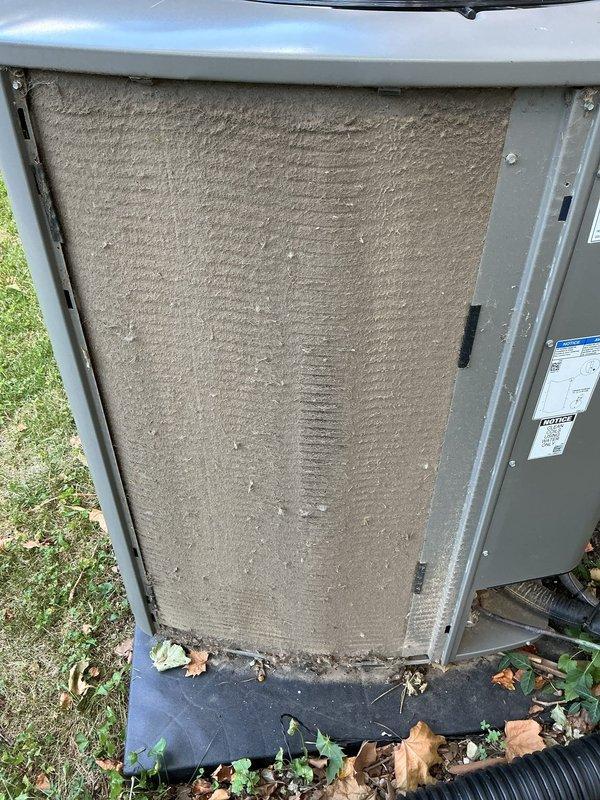 Responded to no-cool complaint on 2-year-old Lennox system unable to maintain setpoint, with indoor temperature reaching only 80°F when thermostat set to 75°F. Upon arrival, performed visual inspection of outdoor condensing unit and accessed interior components. Discovered severely restricted air filter with significant debris accumulation, blocking airflow to the evaporator coil. Removed and replaced dirty filter with new unit per manufacturer specifications. Verified outdoor unit operation, confirmed condenser fan motor running properly, and checked refrigerant lines for proper insulation and condition. Cycled system through complete cooling cycle and monitored temperature differential across coil. System returned to normal operation with proper airflow restored and adequate cooling capacity achieved. Documented conditions with photos showing filter restriction and unit placement. Advised homeowner on recommended filter maintenance schedule to prevent future airflow issues.
