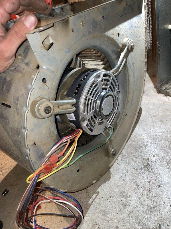 Replaced failed blower motor assembly in HVAC system. Disconnected electrical connections, removed old motor showing significant wear and dirt accumulation, installed new blower motor, reconnected all wiring, and verified proper operation. Old motor disposed of per standard procedures.