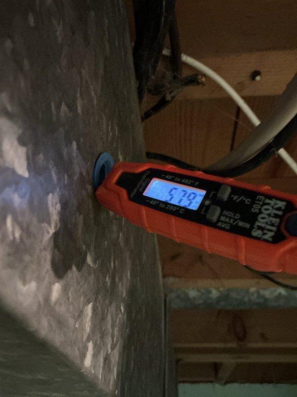 Responded to water leak complaint on 7-year-old Trane furnace system. Upon inspection, identified condensate drainage issue related to condensate pump malfunction. Temperature readings and visual inspection confirmed active leak condition with evidence of water damage to surrounding ceiling surfaces and mounting hardware showing significant corrosion. Documented extensive rust and deterioration on metal components, indicating prolonged moisture exposure. Addressed drainage blockage and restored proper condensate removal function. Verified system operation and confirmed leak resolved. Recommended monitoring for recurrence and consideration of affected component replacement due to corrosion damage.
