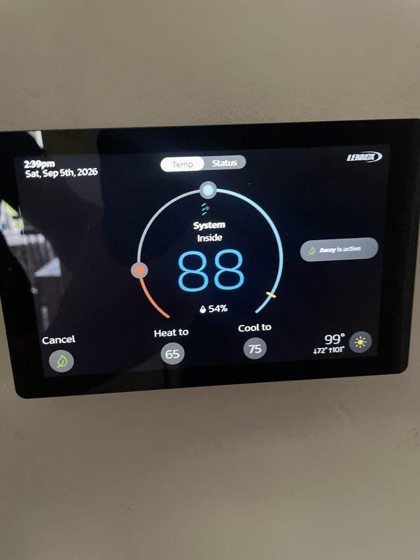 Responded to no cooling complaint on 10+ year old unit located on left side of home. Upon arrival, contacted customer per request to discuss diagnosis before proceeding. Accessed property using provided garage code. Found Lennox thermostat powered on and displaying system status, with indoor temperature reading 88°F while setpoint was 75°F in cooling mode. Thermostat showed "Away is active" mode engaged. System was not responding to cooling calls. Documented thermostat display showing high indoor temperature and humidity levels, confirming lack of cooling operation. Contacted customer to report findings and discuss repair options.