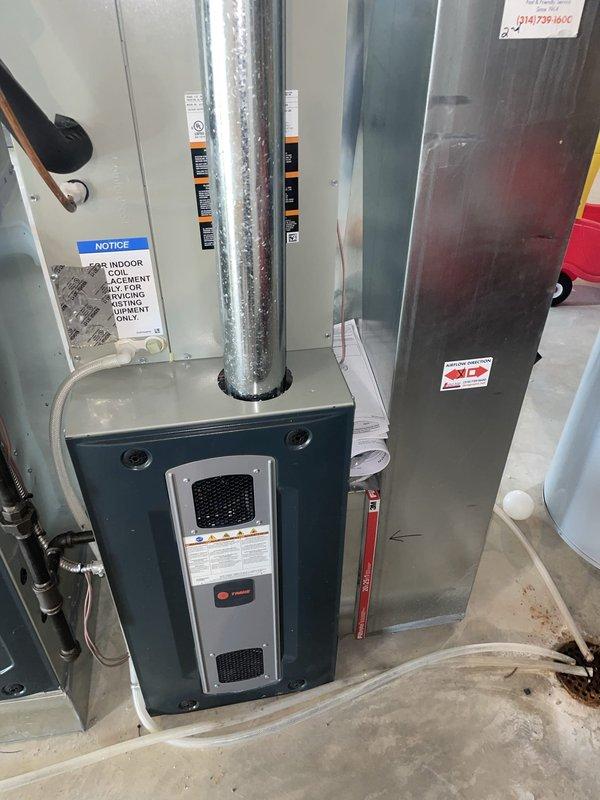 Replaced defective evaporator coil on Trane system due to recall issue where coil was not functioning properly. Removed and disposed of old evaporator coil from unit with serial number 2105521y5g, installed new replacement coil, and attached new serial number for warranty processing. System tested and operational upon completion.
