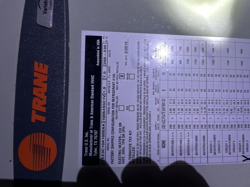 Responded to no cooling complaint affecting entire home with 20-year-old Trane air conditioning system. Advised customer to power down AC unit to prevent potential compressor damage and allow for comprehensive diagnostic evaluation. Performed visual inspection of outdoor condensing unit and indoor air handler, documenting equipment nameplate data and internal component condition through photographic documentation for assessment purposes.