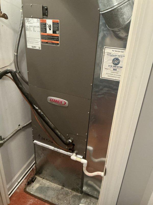 Responded to no cooling complaint on second floor 15-year-old Lennox system. Upon arrival, confirmed outdoor condenser unit running but indoor air handler not producing cool air. Connected manifold gauge set to service ports and performed refrigerant pressure analysis. System pressures indicated significant refrigerant undercharge. Conducted thorough leak inspection of both indoor evaporator coil and outdoor condenser coil. Inspected all refrigerant line connections, service valves, and accessible copper line sets for signs of refrigerant loss. Evaluated overall system condition noting age of equipment and wear patterns consistent with original installation. Documented findings with photos of outdoor unit with gauges attached and indoor air handler installation. Discussed system performance issues and repair options with customer. Due to age of equipment and extent of required repairs, customer elected to defer decision until Tuesday. Left system in safe condition with all service port