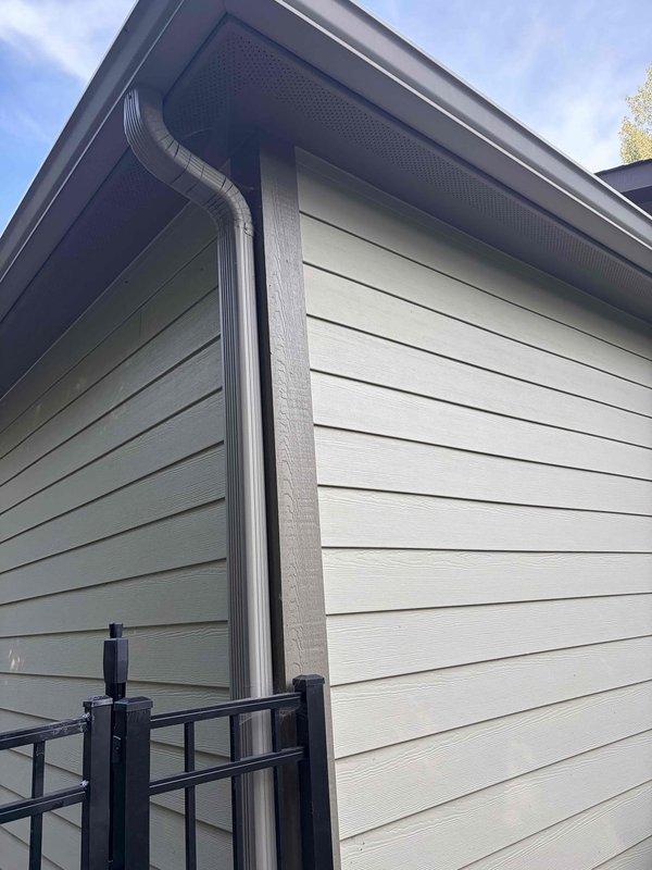 Installed two customer-provided motion-activated light fixtures at the rear exterior of the residence. Verified proper electrical connections at the breaker panel, ran wiring to the mounting locations, and secured fixtures to the exterior siding with appropriate weatherproof mounting hardware and sealed connections to prevent moisture intrusion.