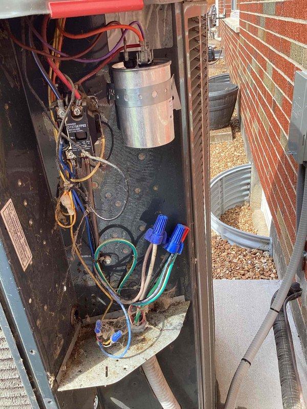 Responded to no cooling complaint on 7-year-old Trane system. Upon inspection, found failed dual run capacitor preventing compressor and condenser fan motor operation. Replaced defective capacitor with manufacturer-specified component, verified proper microfarad ratings, and tested system startup. Unit restored to normal cooling operation with all electrical connections secured and proper amperage draws confirmed on both compressor and fan motor circuits.