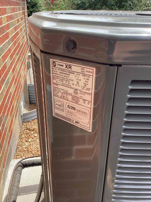 Responded to no cooling complaint on 7-year-old Trane system. Upon inspection, found failed dual run capacitor preventing compressor and condenser fan motor operation. Replaced defective capacitor with manufacturer-specified component, verified proper microfarad ratings, and tested system startup. Unit restored to normal cooling operation with all electrical connections secured and proper amperage draws confirmed on both compressor and fan motor circuits.