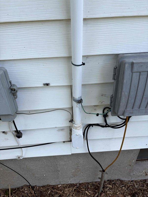 Responded to residential service call to repair or replace two receptacles and switches. Upon arrival, performed visual inspection of electrical system including exterior meter base, service entrance equipment, and associated wiring connections. Documented existing conditions with photographs showing digital utility meter, exterior junction boxes, and service conduit installation. Accessed interior locations to evaluate and service the affected receptacles and switches as requested. Completed necessary repairs or replacements to restore proper functionality to the electrical devices. Verified all connections were secure and tested circuits to ensure safe operation. All work performed in accordance with National Electrical Code standards.