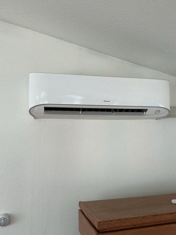 Replaced defective circuit boards on outdoor unit for Daikin ductless mini-split system, serial number k025288. System restored to proper operation with cooling functional throughout main house areas. Retained original circuit boards per protocol.