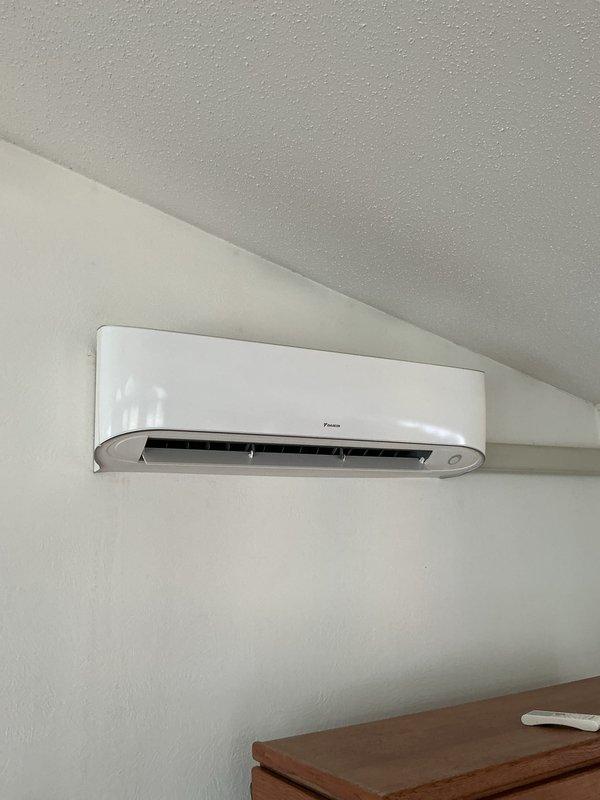 Replaced defective circuit boards on outdoor unit for Daikin ductless mini-split system, serial number k025288. System restored to proper operation with cooling functional throughout main house areas. Retained original circuit boards per protocol.