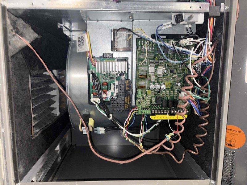 Completed comprehensive AC tune-up on 2.5-year-old Lennox cooling system per customer request due to intermittent louder-than-normal operational noise. Performed full system inspection including visual examination of outdoor condensing unit, verified foam filter panels intact and clean, inspected all copper refrigerant lines and connections, checked electrical components and control boards for proper operation, and assessed blower motor assembly. All components found operating within normal parameters; system tested and running efficiently with no abnormal sounds detected at time of service.