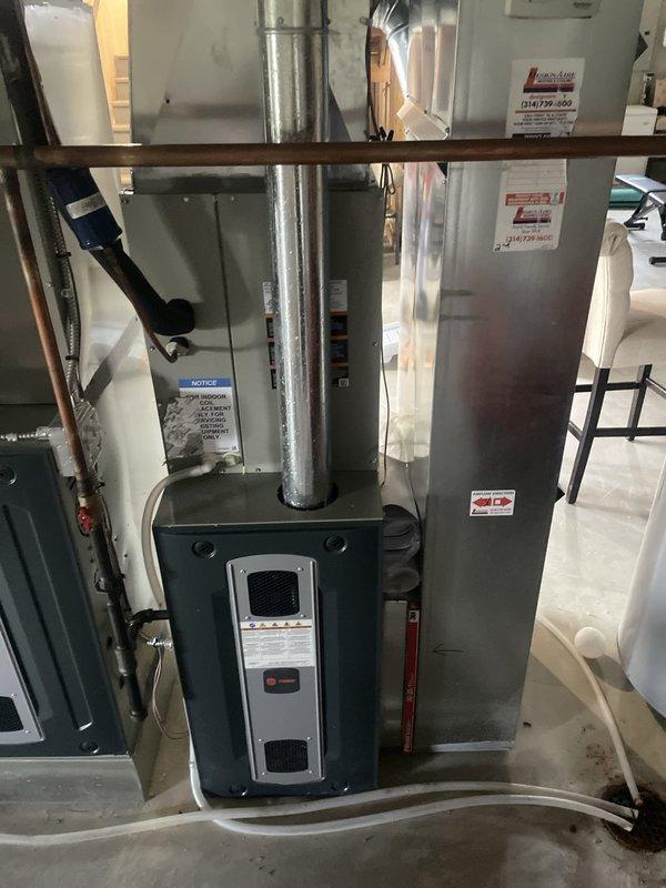 Replaced failed compressor on second floor HVAC unit (serial 21132fse3f). Installed new Trane compressor and plug, restoring cooling function to the second floor zone. Retained original compressor for warranty documentation and recorded serial numbers of both old and new units for service records.