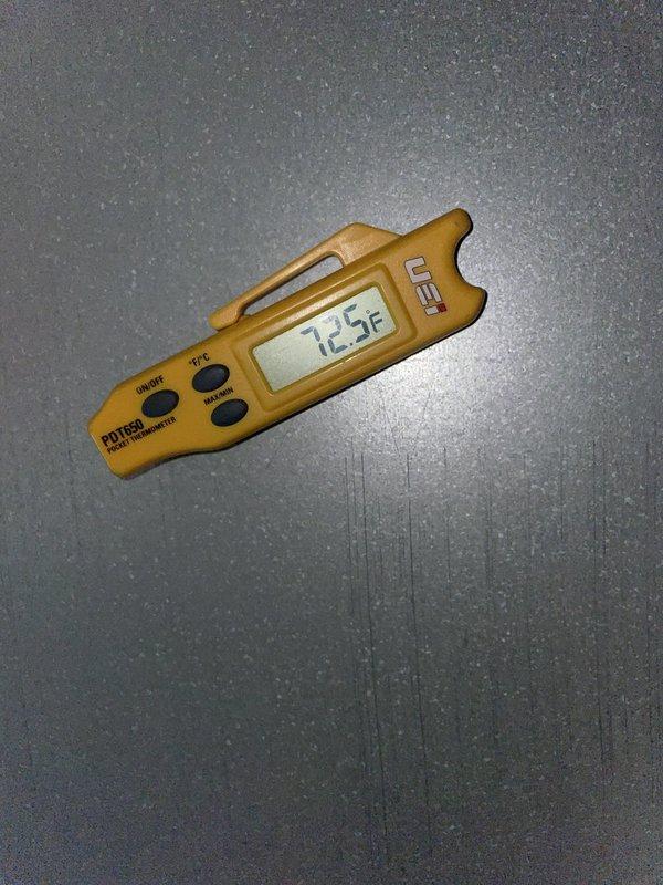 Responded to install callback for system displaying Error ID 411 with no cooling to any zones. Upon arrival, verified indoor temperature at 72.5°F and inspected outdoor unit. Discovered severely deteriorated line set penetration through exterior wall with compromised mounting pad and damaged conduit support. The concrete pad supporting the refrigerant lines showed extensive cracking and material failure, exposing interior cavities and creating potential for refrigerant line damage or restriction. Documented conditions with photos showing temperature readings and exterior damage to penetration assembly and mounting structure requiring immediate attention to prevent system failure.