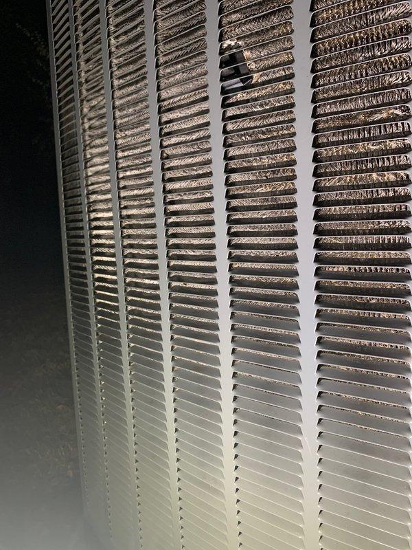 Responded to scheduled service call for HVAC system evaluation. Upon arrival, performed visual inspection of evaporator coil assembly, which revealed significant accumulation of dirt, dust, and oxidation throughout the fin structure, with heaviest contamination concentrated in the upper two-thirds of the coil. The discoloration pattern indicated restricted airflow and reduced heat transfer efficiency. Connected digital manifold gauge to assess system pressures and temperatures, obtaining diagnostic readings to evaluate overall system performance. Job was cancelled after dispatch and prior to completion of repair work. Documented equipment condition through photographs for service records.