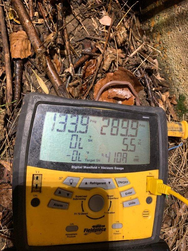 Responded to scheduled service call for HVAC system evaluation. Upon arrival, performed visual inspection of evaporator coil assembly, which revealed significant accumulation of dirt, dust, and oxidation throughout the fin structure, with heaviest contamination concentrated in the upper two-thirds of the coil. The discoloration pattern indicated restricted airflow and reduced heat transfer efficiency. Connected digital manifold gauge to assess system pressures and temperatures, obtaining diagnostic readings to evaluate overall system performance. Job was cancelled after dispatch and prior to completion of repair work. Documented equipment condition through photographs for service records.