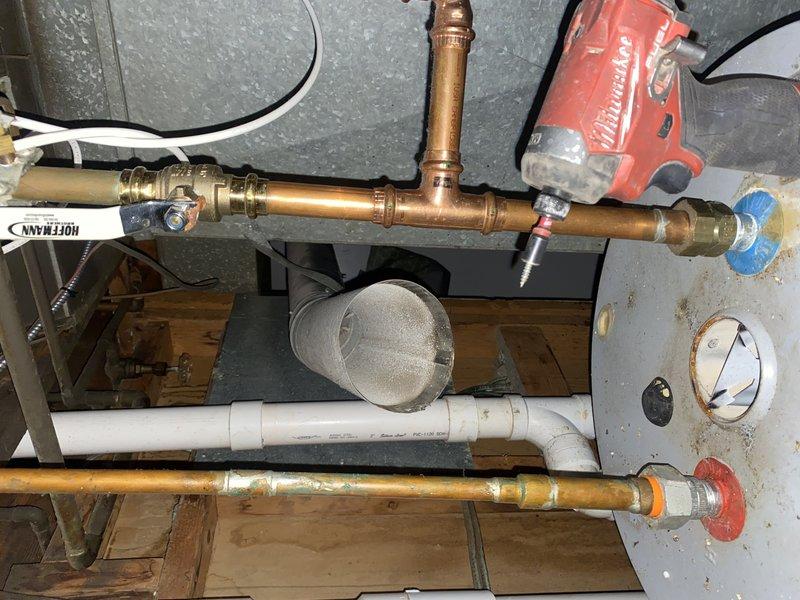 Completed installation of 40-gallon tall gas water heater under permit 26PLU-18138. Unit installed with proper copper supply piping, pressure relief valve, and gas connections per code requirements. Applied required identification sticker and verified all connections for proper operation and safety compliance.