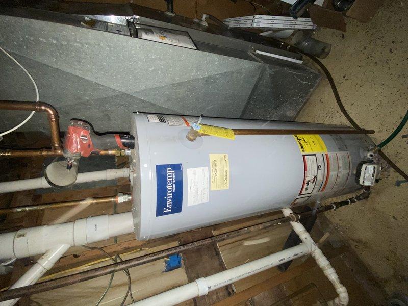 Completed installation of 40-gallon tall gas water heater under permit 26PLU-18138. Unit installed with proper copper supply piping, pressure relief valve, and gas connections per code requirements. Applied required identification sticker and verified all connections for proper operation and safety compliance.