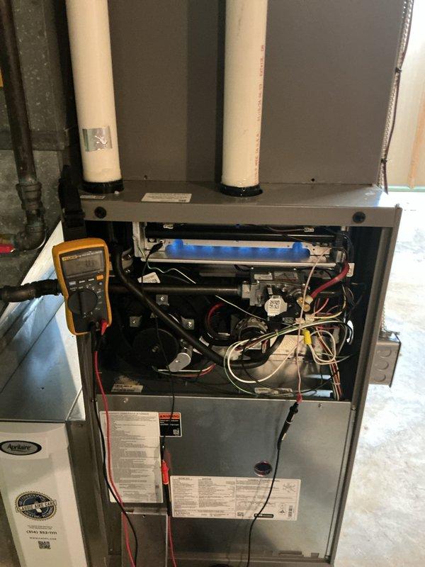 Completed comprehensive Supertune maintenance on Lennox furnace unit located at ground level on side of home. Performed full system diagnostics with multimeter to verify electrical components, inspected and tested all internal mechanical systems, checked wiring connections and safety controls, and confirmed proper operation of thermostat control system. Unit is operating within manufacturer specifications and ready for the heating season.