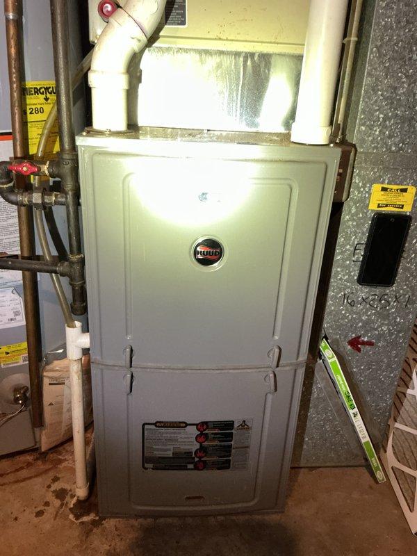 Completed comprehensive AC Super Tune service on Ruud residential HVAC system with age unknown to homeowner. Performed full system inspection including furnace, evaporator coil, and control board components. Verified all electrical connections, refrigerant line integrity, gas piping, and shut-off valves functioning properly. Inspected control board wiring and terminals, confirmed proper operation of all safety controls and system components. System operating within normal parameters with no deficiencies noted at time of service.
