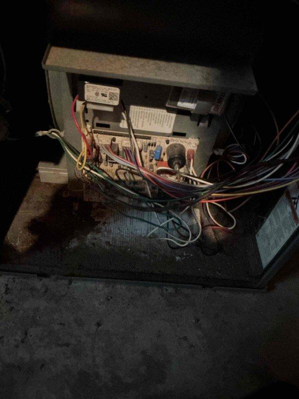 Completed comprehensive AC Super Tune service on Ruud residential HVAC system with age unknown to homeowner. Performed full system inspection including furnace, evaporator coil, and control board components. Verified all electrical connections, refrigerant line integrity, gas piping, and shut-off valves functioning properly. Inspected control board wiring and terminals, confirmed proper operation of all safety controls and system components. System operating within normal parameters with no deficiencies noted at time of service.