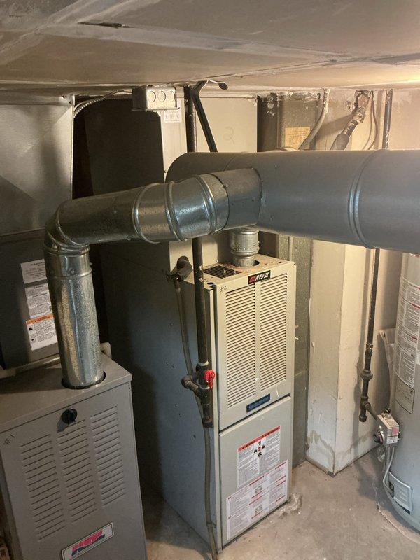 Responded to service call for air conditioning unit running loud at residential property. Inspected 10-year-old condenser unit located on ground level at side of house and corresponding indoor air handler in utility closet. Upon evaluation, turned off AC system per customer instructions and left fan in continuous operation mode to maintain air circulation while unit remains offline pending further diagnostics or repairs.