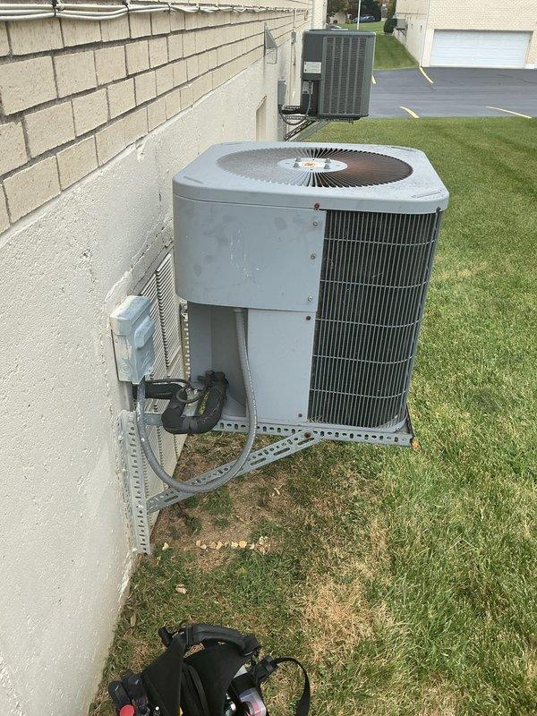 Responded to service call for air conditioning unit running loud at residential property. Inspected 10-year-old condenser unit located on ground level at side of house and corresponding indoor air handler in utility closet. Upon evaluation, turned off AC system per customer instructions and left fan in continuous operation mode to maintain air circulation while unit remains offline pending further diagnostics or repairs.