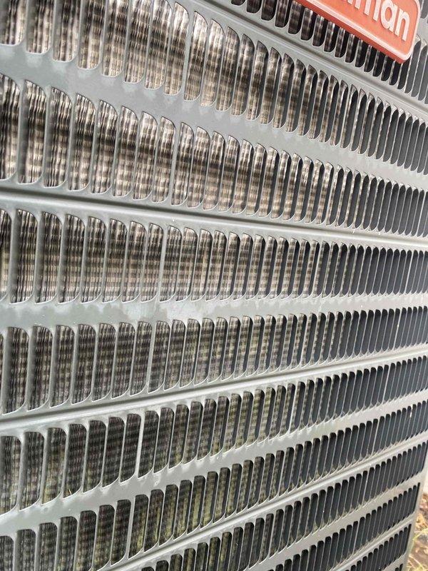 Completed comprehensive AC tune-up and maintenance service on a single outdoor condensing unit over 10 years old located in side yard. Performed thorough inspection of heat exchanger coils, documenting fin condition and verifying proper heat transfer capability. Recorded system operating temperatures, with ambient readings at 51°F, confirming unit functionality during seasonal maintenance check. Cleaned and inspected all accessible components, ensuring system is operating efficiently and ready for continued service.