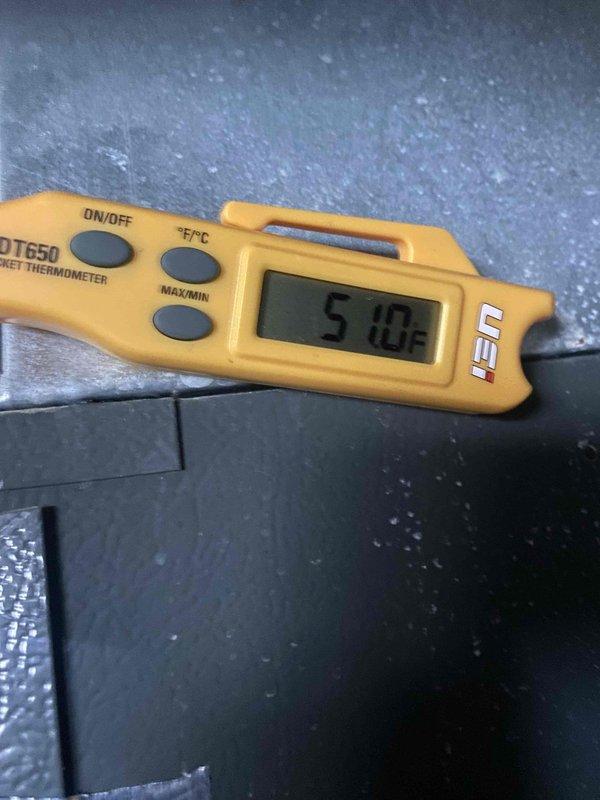 Completed comprehensive AC tune-up and maintenance service on a single outdoor condensing unit over 10 years old located in side yard. Performed thorough inspection of heat exchanger coils, documenting fin condition and verifying proper heat transfer capability. Recorded system operating temperatures, with ambient readings at 51°F, confirming unit functionality during seasonal maintenance check. Cleaned and inspected all accessible components, ensuring system is operating efficiently and ready for continued service.