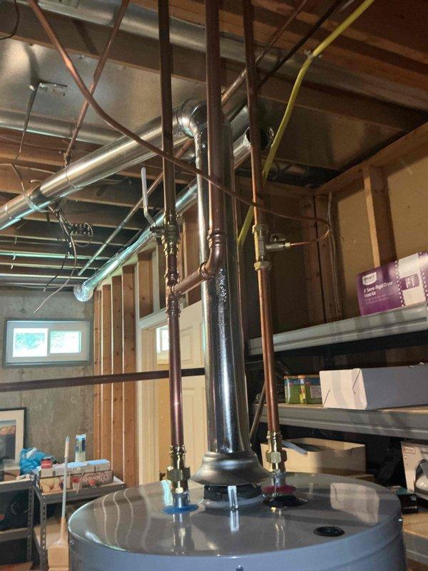 Installed 50-gallon tall gas water heater in accordance with permit 26PLU-18191, including all necessary supply and discharge piping connections with copper lines, proper venting installation, and code-compliant mounting. Evaluated residential water pressure and determined system requirements for potential pressure reducing valve installation to protect plumbing fixtures and appliances.