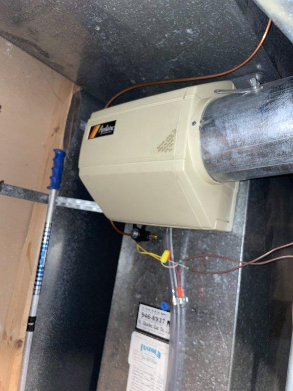 Replaced maintenance kit on humidifier unit including new filter pad and associated hardware. Unit tested and confirmed operational with proper water flow and electrical connections verified. System returned to normal heating and cooling operation.