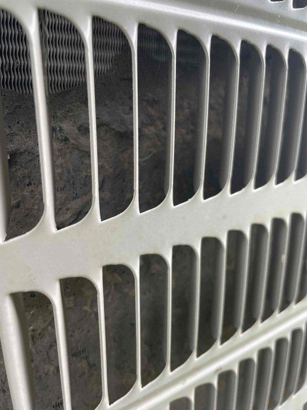 # HVAC Cooling System Tune-Up Completed

Performed comprehensive preventive maintenance tune-up on a single cooling unit over 10 years old located in backyard. Conducted standard seasonal inspection including filter assessment, electrical connection verification, and internal component evaluation. Return air grate showed significant dust and debris accumulation on interior surfaces, indicating reduced airflow efficiency. Inspected interior furnace/air handler components including control board, wiring harness connections, and blower assembly housing. All electrical connections including brown, red, blue, and yellow/green wires were examined for proper termination and signs of wear. Interior surfaces displayed normal operational dust accumulation consistent with unit age. System operational parameters verified and unit left in serviceable condition for continued cooling season operation.