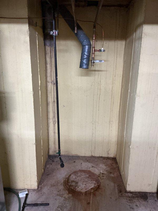 Completed installation of 50-gallon tall gas water heater in utility room under permit #26PLU-18189. Unit was set up for delivery and positioned in designated location with proper clearances. All copper supply lines, shut-off valves, and gas connections were installed per code requirements, and drain pan with appropriate drainage was configured. Installation was performed by licensed plumber and passed required inspections with permit identification sticker attached to unit.