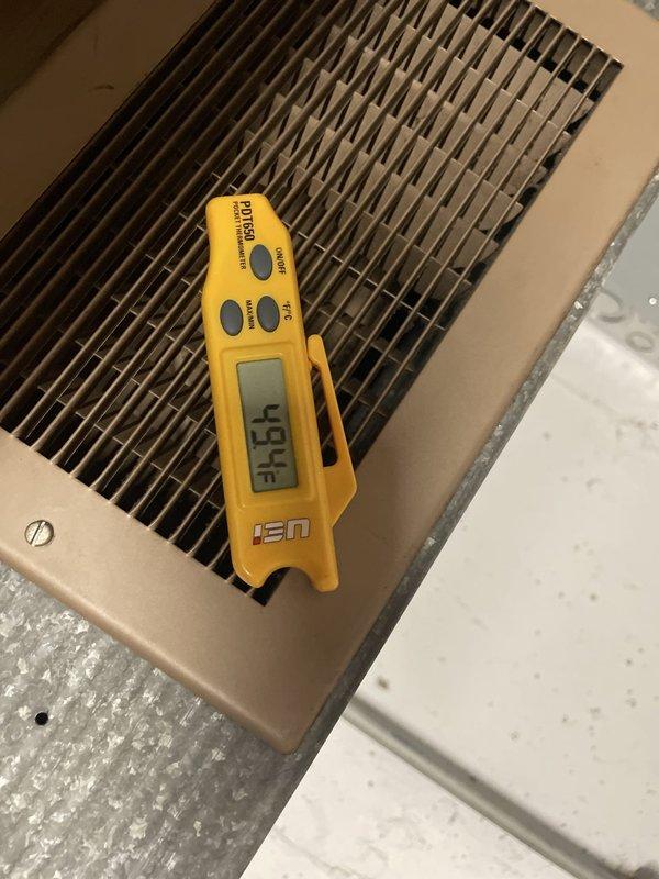 Responded to complaint of loud humming/buzzing noise from outside Lennox condensing unit approximately 1 year old. Upon arrival, performed system diagnostics and temperature measurements. Verified supply air temperature at 42°F at interior register and measured return air temperature at 87.2°F, confirming proper temperature split and system cooling operation. Inspected outdoor unit for source of abnormal noise, checked electrical connections, contactor operation, and compressor function. System operating within normal parameters at time of inspection with acceptable airflow and refrigerant performance indicated by temperature readings.