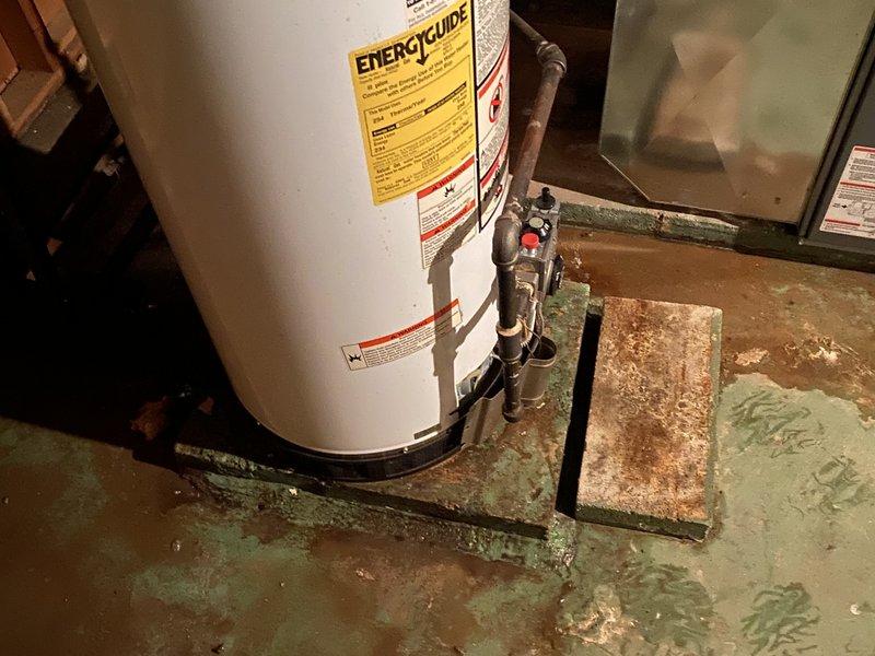 Responded to a no hot water call and found a 19-year-old gas water heater that had failed. Removed and properly disposed of the existing unit, which showed signs of significant water damage and deterioration at the base. Installed a new 40-gallon gas tall water heater with proper venting and gas connections. Replaced the cold water drop with new 3/4" copper piping, including slip coupling, tee, and 90-degree fittings above the unit. Installed a new 3/4" pressure reducing valve to protect the system. Tested all connections for leaks, verified proper gas combustion, and confirmed hot water restoration throughout the home. Applied required plumbing identification sticker and completed work under permit #26PLU-18271.
