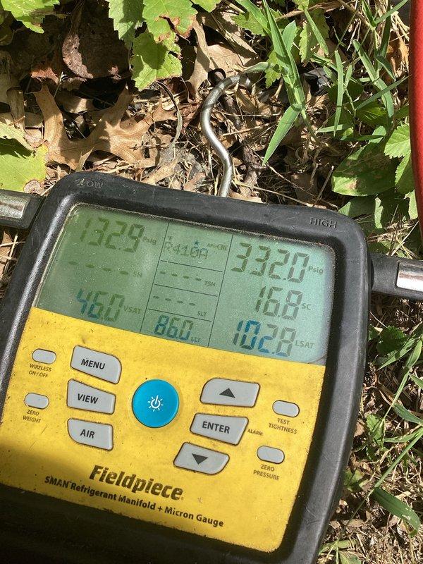 Responded to call for water leaking from AC drain line in basement. Upon arrival, found significant water accumulation on concrete floor around furnace and HVAC system. Inspected condensate drain system and identified clogged drain line causing overflow. Cleared blockage from drain line, verified proper drainage flow, and tested system operation. Checked refrigerant pressures and temperatures on outdoor unit to confirm AC system was functioning within normal parameters. System restored to proper operation with condensate draining correctly and no further leakage observed.