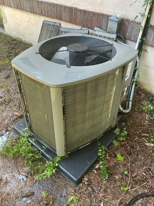 Replaced failed blower motor and installed new UV light in attic-mounted air handler. Completed post-service checkout and commissioning (PSCC) to verify proper system operation. Coils showed significant dust and debris accumulation, and outdoor condenser unit was inspected to ensure proper airflow and refrigerant line integrity.