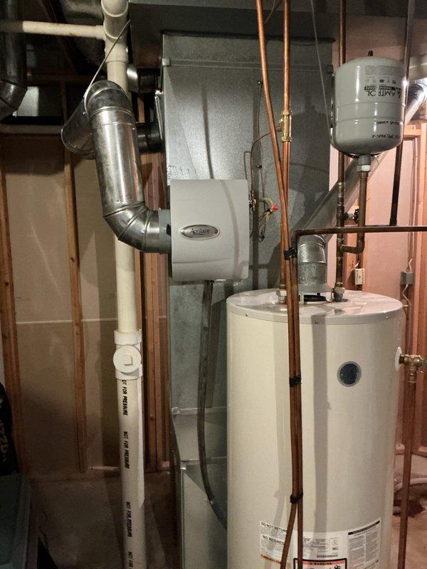 Completed scheduled heating maintenance on basement furnace unit as part of preventative maintenance agreement. Performed comprehensive tune-up including system inspection, filter replacement with new pleated air filter, and verification of humidifier operation. All components found operating within normal parameters with no issues identified.