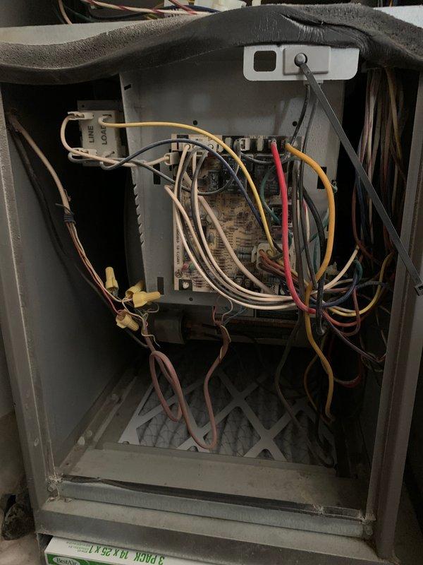 Completed comprehensive tune-up and maintenance service on a single outdoor air conditioning unit, approximately 5-10 years old. Performed full system inspection including electrical component examination, verifying all wire connections, control board functionality, and safety circuits within the indoor air handler cabinet. Inspected condenser unit exterior, noting moderate weathering and surface corrosion consistent with age and outdoor exposure. Cleaned and evaluated fan assembly, checked refrigerant levels, tested electrical connections, and verified proper system operation. All components found functioning within normal parameters. System operational and ready for continued service.