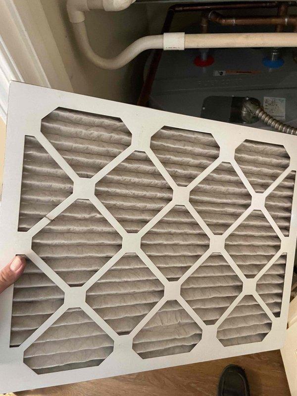 Responded to service call for air conditioning unit causing water condensation issues affecting units below. Upon inspection, discovered severely clogged air filter restricting airflow and causing improper drainage from the evaporator coil. Replaced dirty air filter with new unit, inspected condensate drain line for blockages, and verified proper drainage flow. Examined outdoor condenser unit for any additional issues affecting system performance. System tested and confirmed operating within normal parameters with no further condensation leakage.