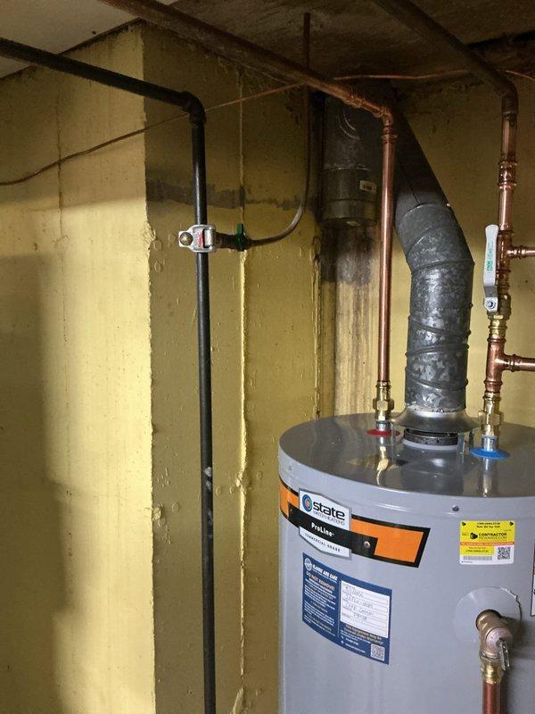 Responded to callback for water heater pilot light that extinguished over the weekend following previous week's installation. Upon arrival, inspected State brand water heater and gas supply connections, relit pilot light, and verified proper ignition and burner operation. Confirmed all gas line connections secure and system functioning normally with no further issues detected.