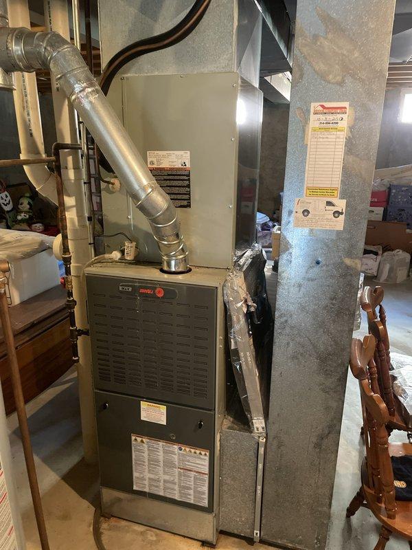 Responded to no cooling complaint on 13-year-old residential HVAC system. Upon arrival, contacted customer per request and proceeded with diagnostic evaluation. Found severely restricted airflow due to excessive dust and debris accumulation on return air grilles, significantly reducing system efficiency and cooling capacity. Cleaned all return vents and verified proper airflow restoration. Inspected furnace unit and ductwork in basement area, confirmed system operational with adequate cooling performance after addressing airflow obstruction.