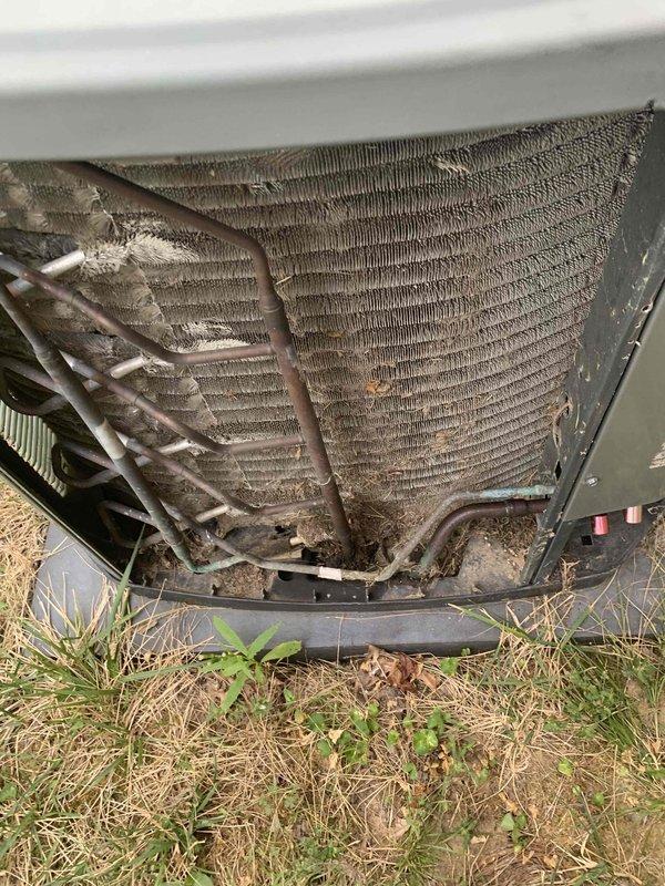 Completed comprehensive cooling season tune-up on 10-year-old residential air conditioning system per scheduled maintenance protocol. Performed full system inspection including blower motor assembly, electrical connections, and refrigerant lines. Condenser coil showed significant accumulation of dirt, dust, and debris restricting airflow; thoroughly cleaned exterior coil fins to restore proper heat transfer efficiency and system performance.