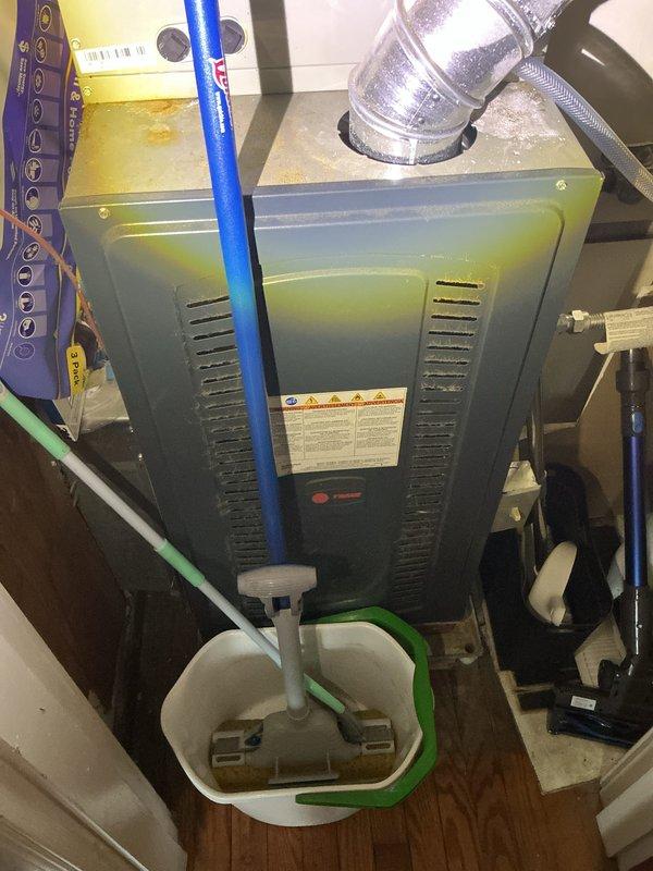 Completed preventive maintenance tune-up on residential air conditioning system located in side yard. Performed standard inspection of outdoor condensing unit, checked refrigerant levels, cleaned condenser coils, verified electrical connections, and tested system operation. Indoor furnace unit inspected for proper airflow and drainage, with all components found to be operating within normal parameters.